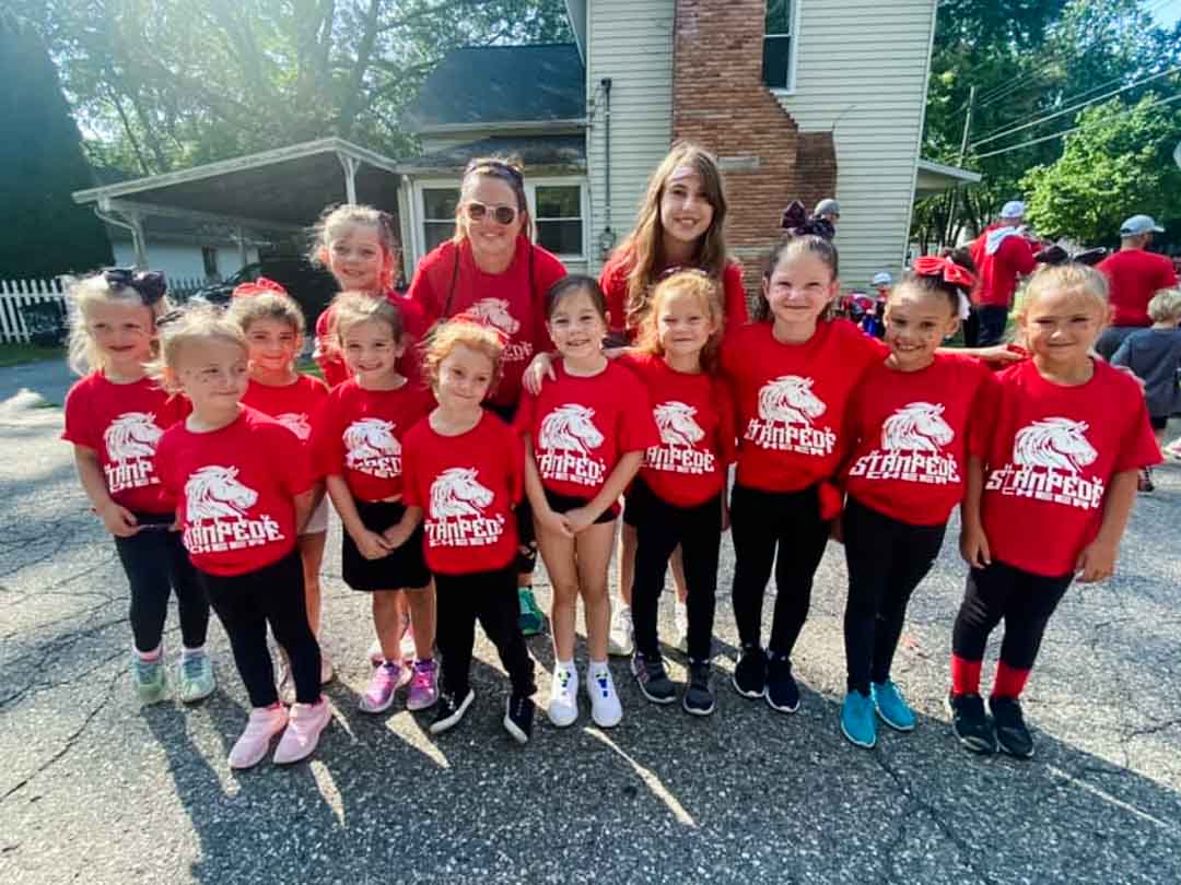 Cheerleaders with Volunteers